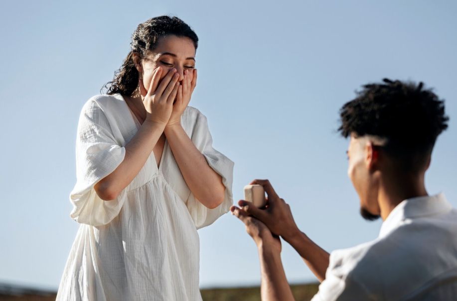 Woman tearing up during an outdoor marriage proposal