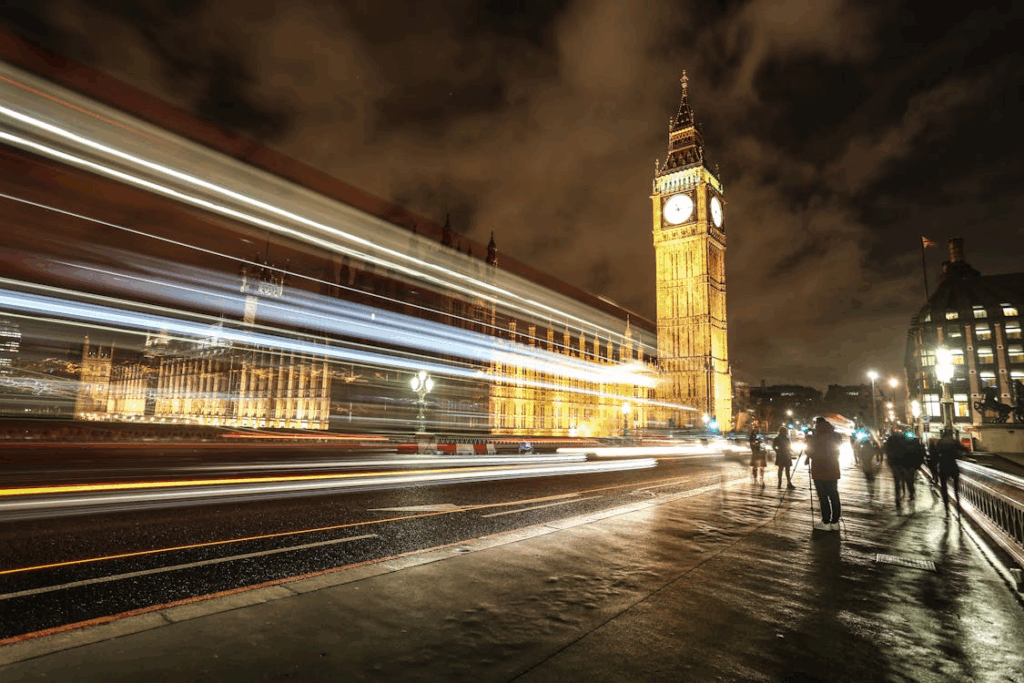 Night view of Big Ben and the Houses of Parliament featuring time perception and motion blur
